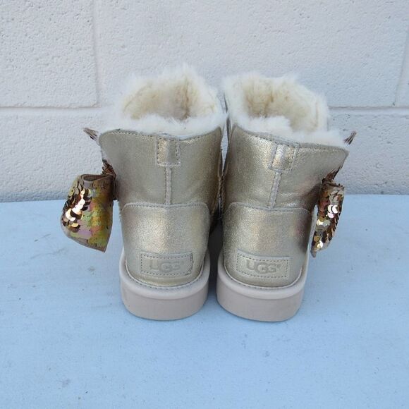 UGG WOMEN'S MINI SEQUIN BOW BOOTS IN GOLD SZ 6 - Picture 5 of 8